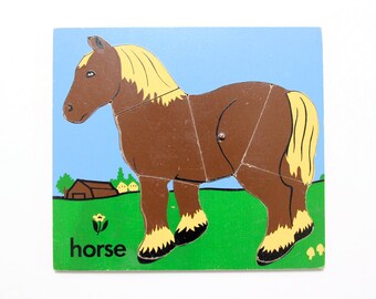 Vintage wooden jigsaw puzzle in horse design
