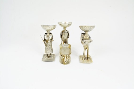 small silver figurines