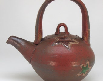 Red Teapot with Multicolored Stars