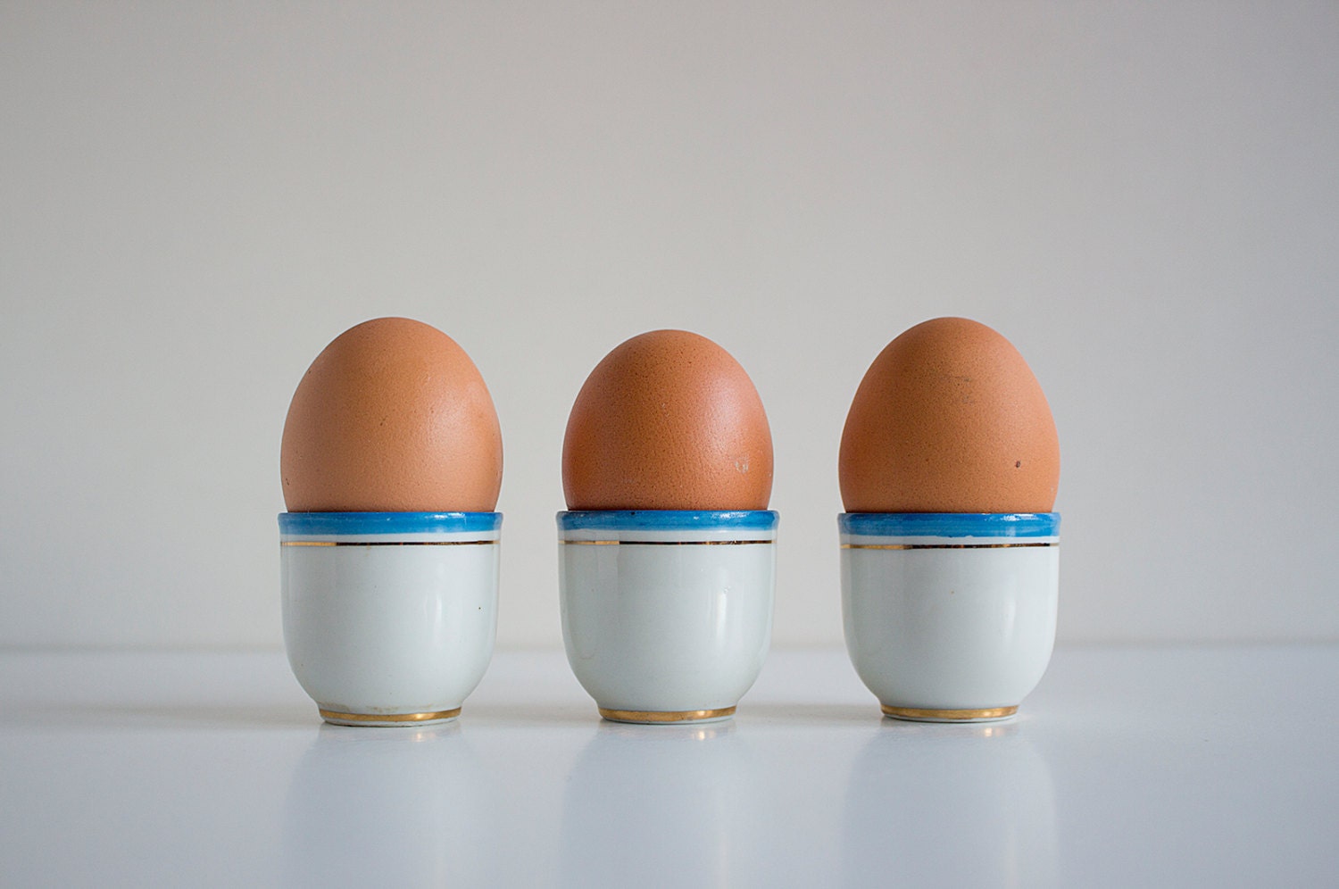 Vintage White Egg Cups Set of 3, Soviet Faience Egg Holders, Retro