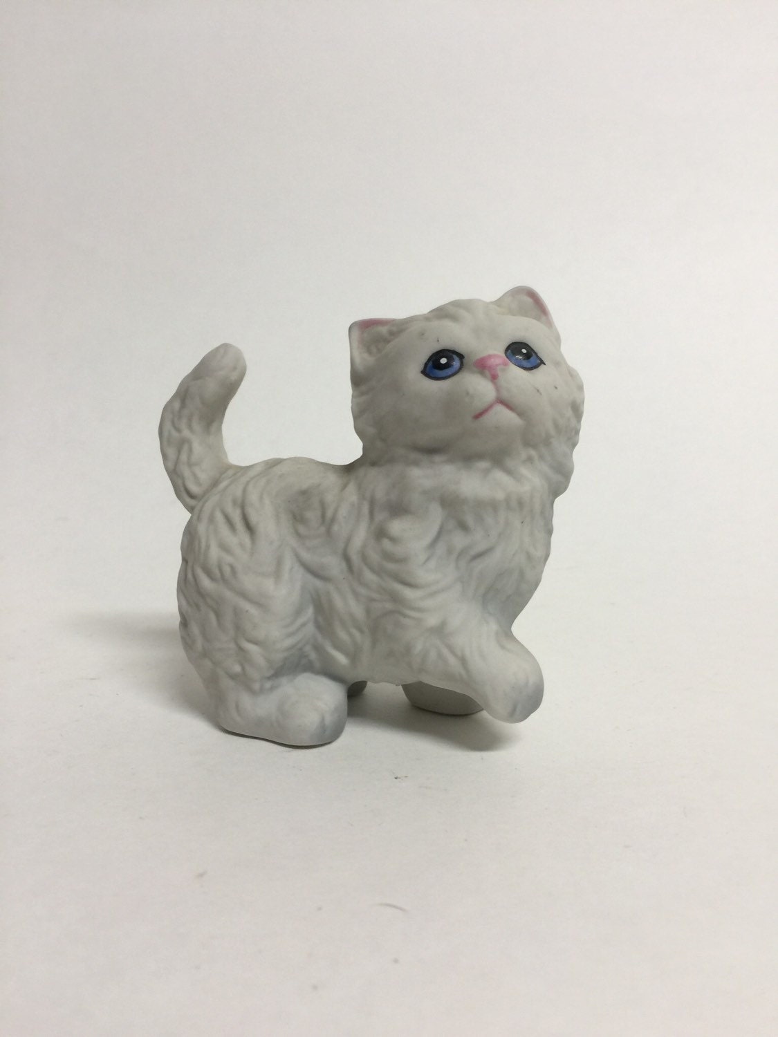 black and white ceramic cat figurine