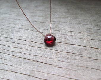 GARNET floating stone necklace on a fine silk cord minimalist gemstone necklace January birthstone healing stone