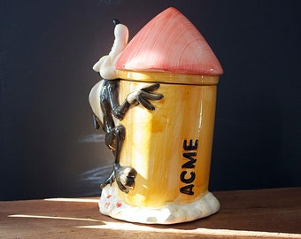 ACME cookie jar Featuring Wylie E Coyote riding a Rocket