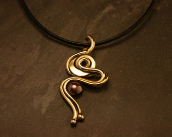 Bronze Triple Loop Pendant on Leather cord by HannahJeanMetalworks