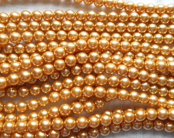 50 6mm gold glass pearl druk beads, golden Preciosa Czech round, smooth glass pearls C5750
