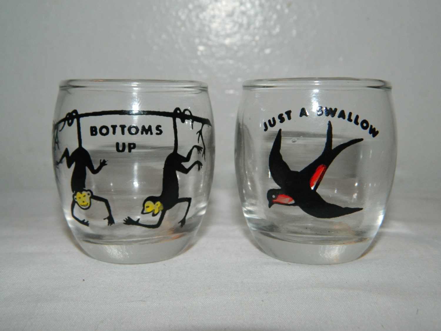 Two Vintage Shot Glasses Bird Just A Swallow Monkey Bottoms