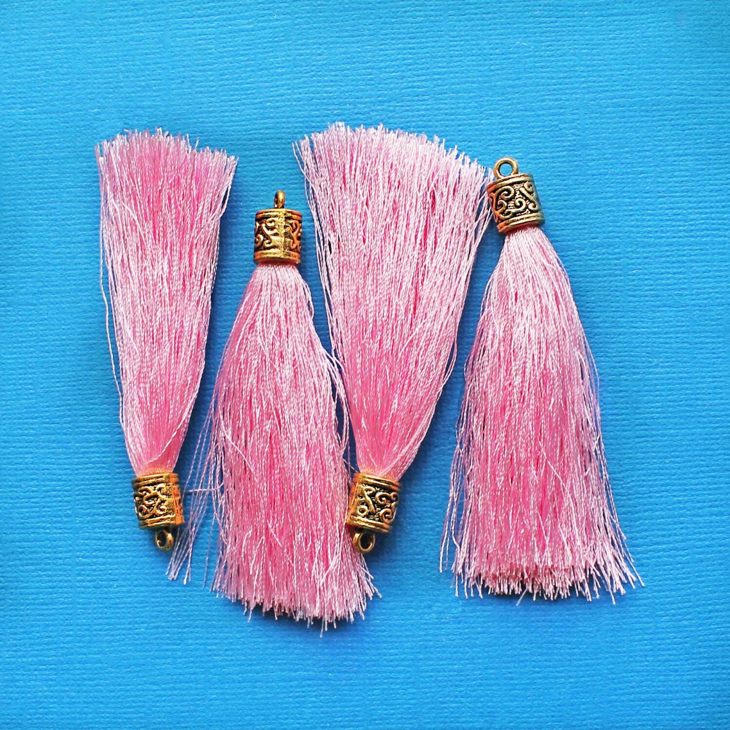 pink tassel mules