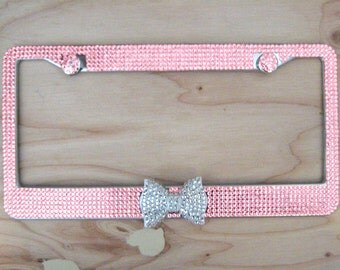 Pink Glass Bling Rhinestone License Plate Frame with Clear/White Bow on Middle and 2 Caps