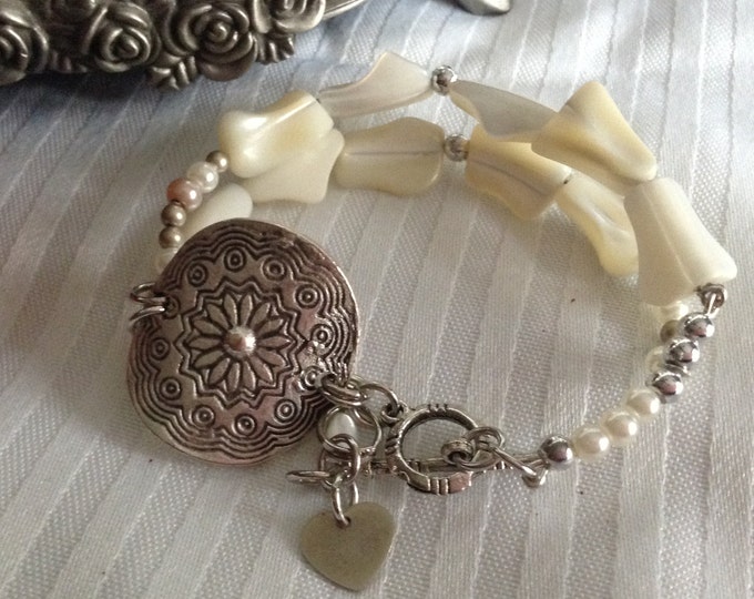 White Mother of Pearl Silver Disc Bracelet...Toggle clasp with charms
