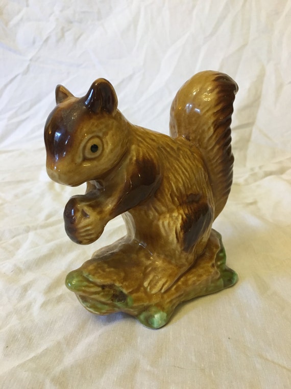 Vintage Ceramic Squirrel Eating Nut Figurine by AmericasMainStreet