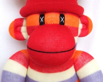 pink striped sock monkey
