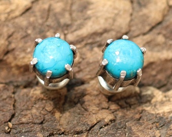 Turquoise post earrings in silver prong setting