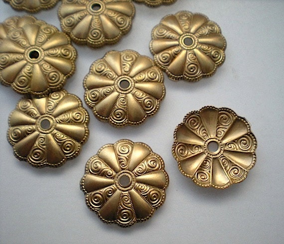 12 brass mirror rosettes No. 15