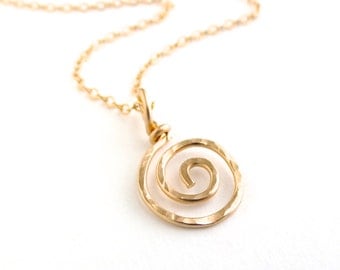 Gold sun swirl pendant. Gold spiral necklace pendant.
