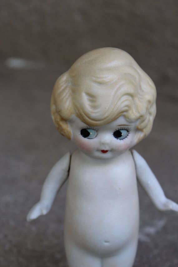 porcelain kewpie doll