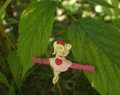 fairy on a swing figurine