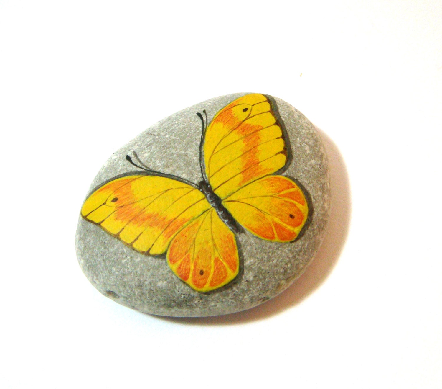 Yellow orange butterfly hand painted rock