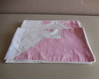 A pair of French vintage pillowcases