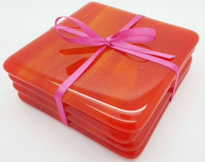 Red and orange fused glass handmade tile coaster set. Tableware. Patio, conservatory. House and home decor. Wedding, housewarming gift.