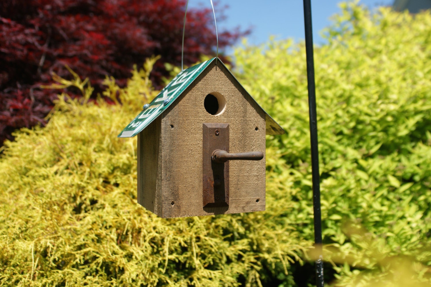 Rustic hanging birdhouse perfect for home or garden