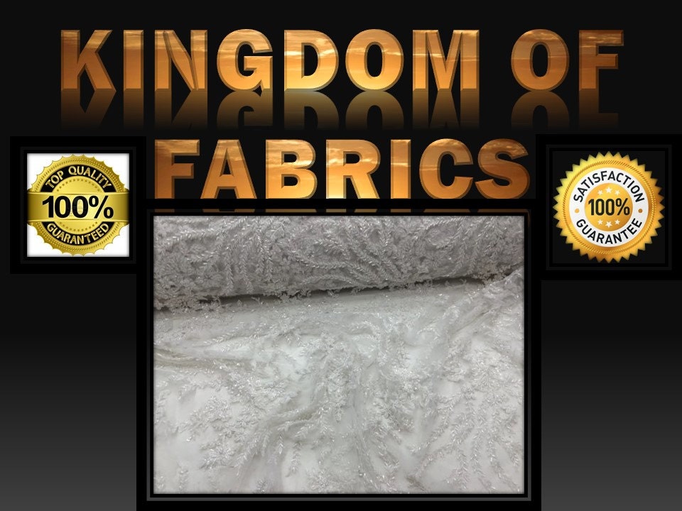 Bridal luxury wedding white beaded mesh fabric lace. Sold by