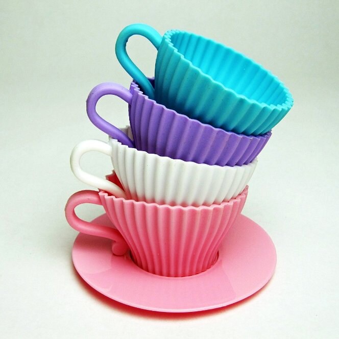 plastic tea cups with saucers