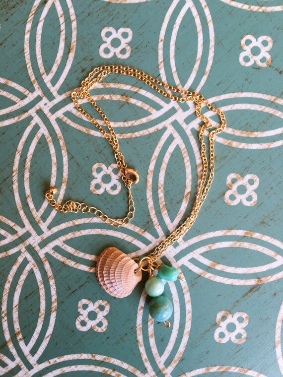 Items similar to Green Charm Seashell Necklace on Etsy