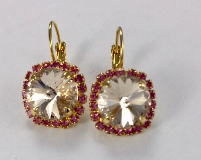Swarovski rivoli glamorous fancy crystal dangle drop earrings in yellow gold with a pave halo of pink crystals.