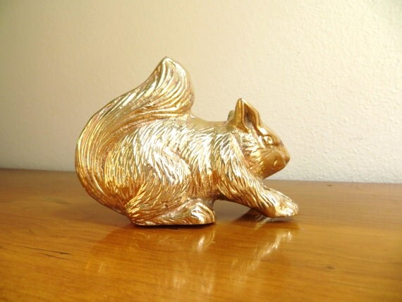 gold squirrel figurine
