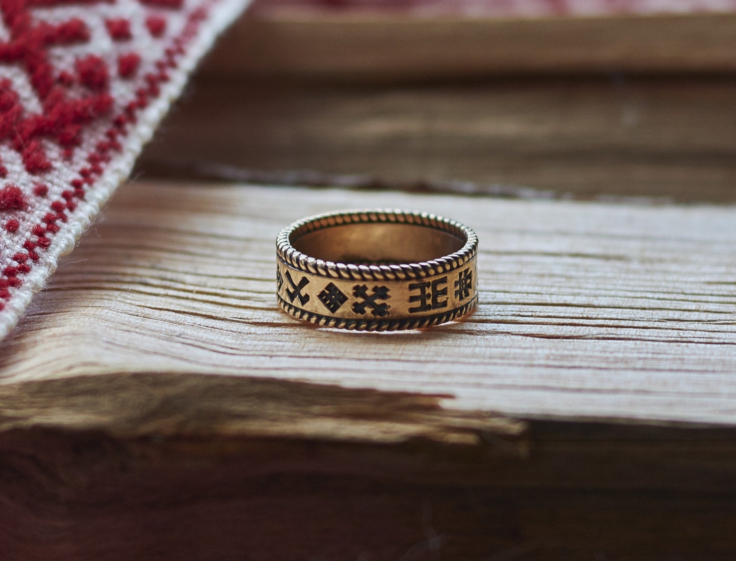 Bronze ring with Baltic Latvian ancient signs. Baltic Latvian
