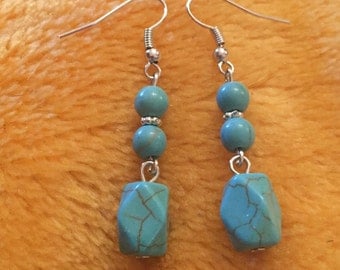 Turquoise blue howlite silver dangly earrings
