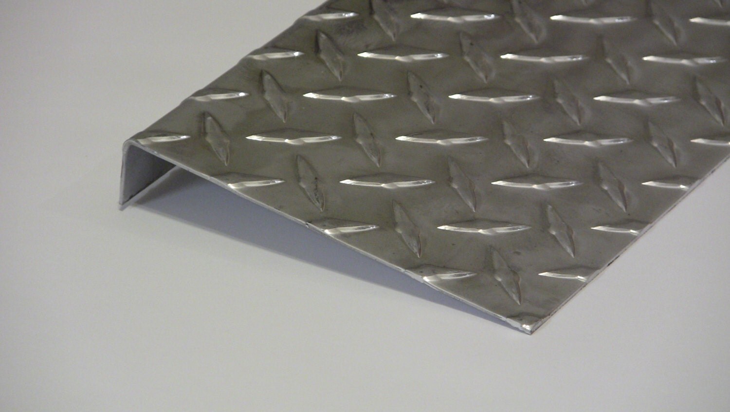 Aluminum Diamond Plate Angle .062 x 1 x 6 x 48 in. Offset UAAC