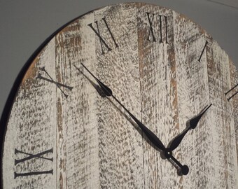 30“ Large Rustic Wall Clock. Made from rough cut lumber. Distressed and finished to give it that barnwood / reclaimed lumber look.