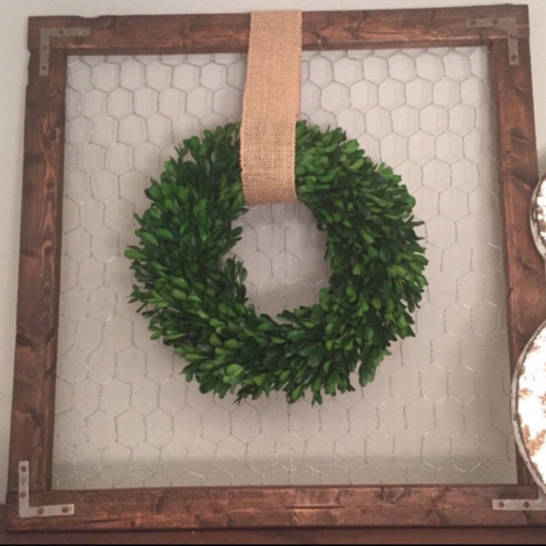 Farmhouse wood frame with preserved boxwood wreath