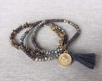 Items Similar To Ooak Beaded Bracelet On Elastic String With Tassel And