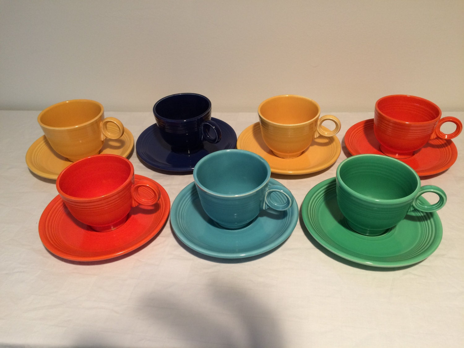 Set of 7 Original Fiestaware Cups and Saucers