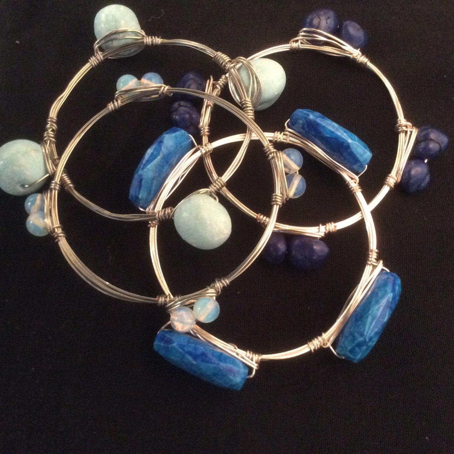 Handmade wire wrap bracelets-set of 4 by JoeLinaDesigns on Etsy
