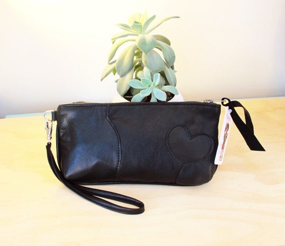 black leather wristlet clutch bag