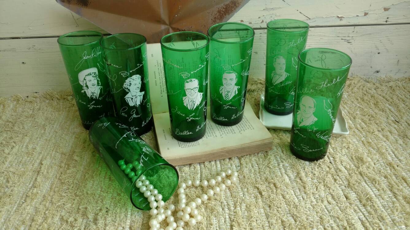 7 Mid Century Green Glass Tumblers Commemorating a Vintage