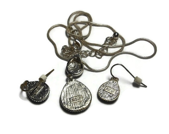 FREE SHIPPING Kenneth Cole necklace and earrings, black teardrop framed by a knot pattern, white swirled enamel glitter reverse teardrop too