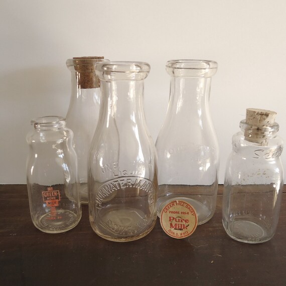 antique milk bottles embossed milk bottles Vintage glass
