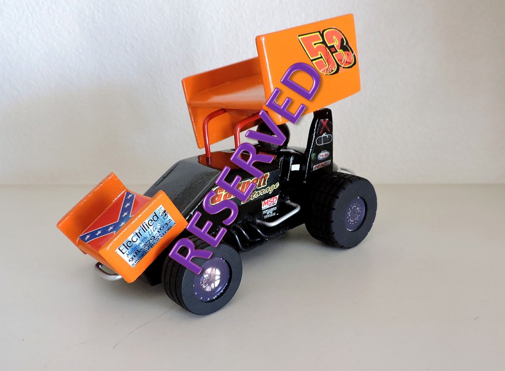 Handmade wooden toy sprint car with driver wings roll by DeVicci