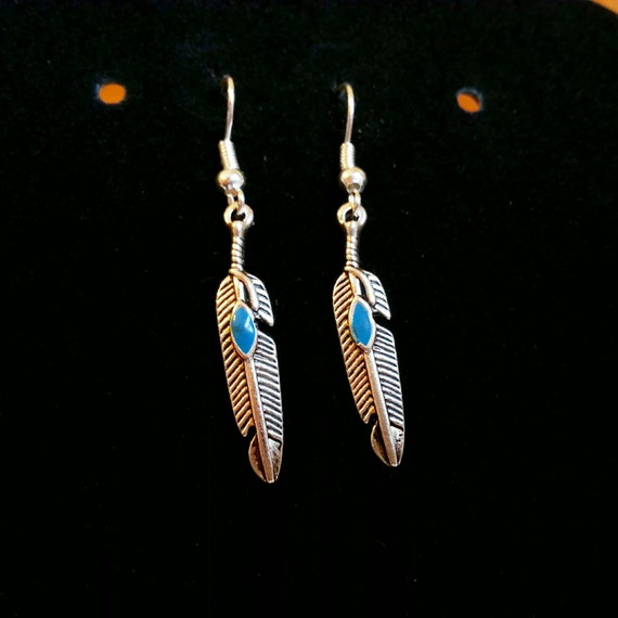 Silver turquoise feather dangle earrings.