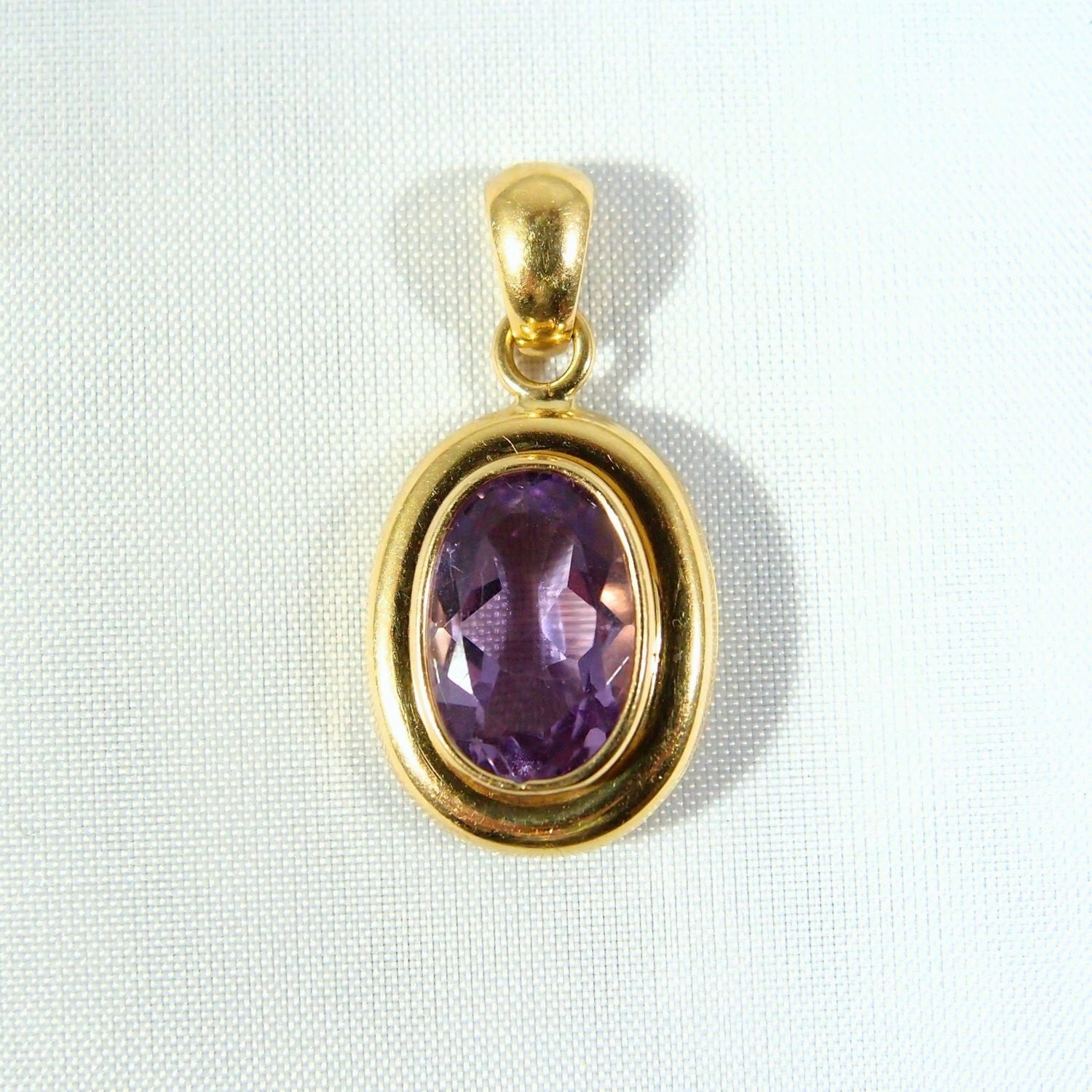 Hallmarked amethyst pendant in 18K solid gold French