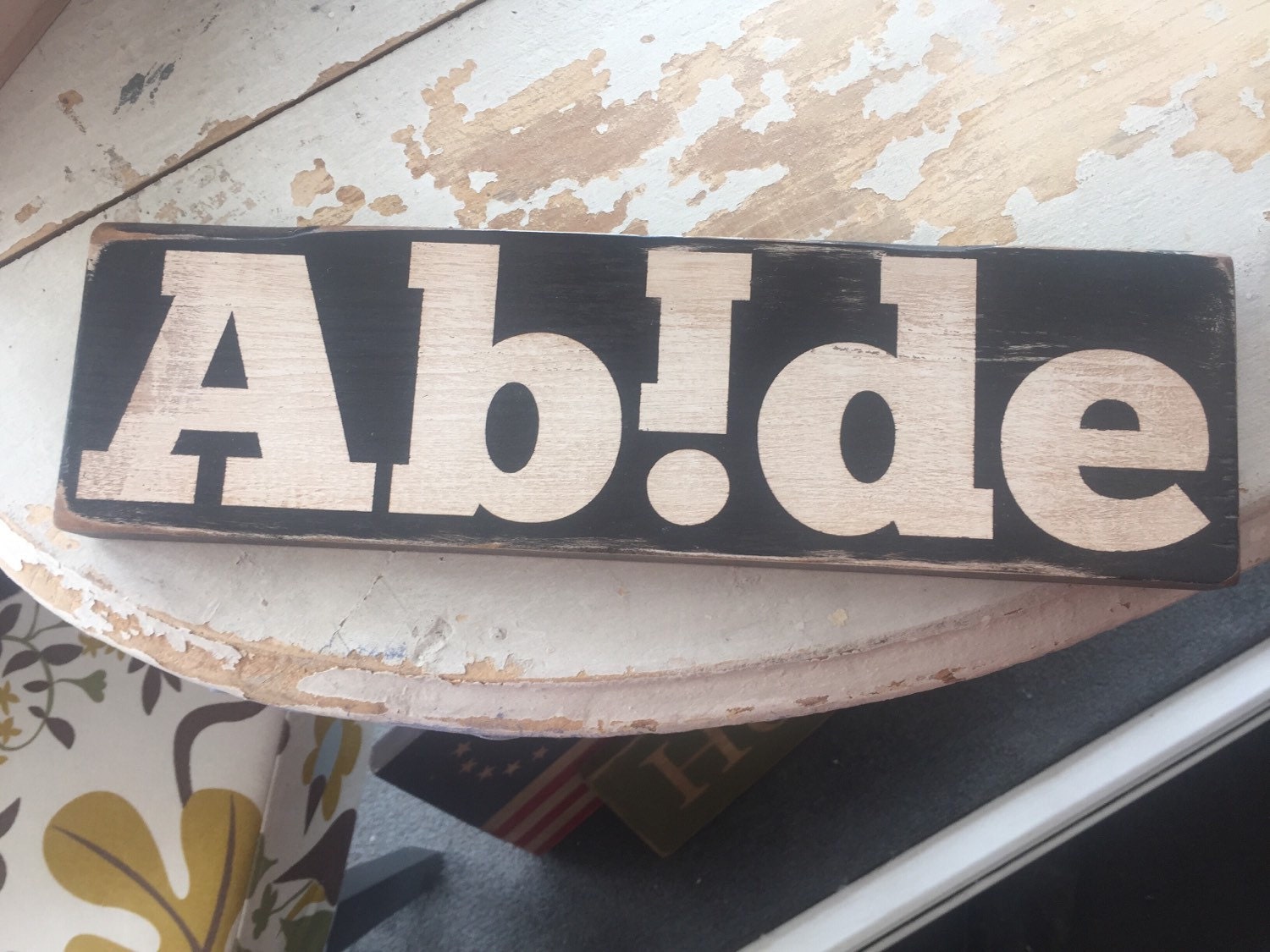 the-abide-sign-ironic-word-play-with-inverted-i