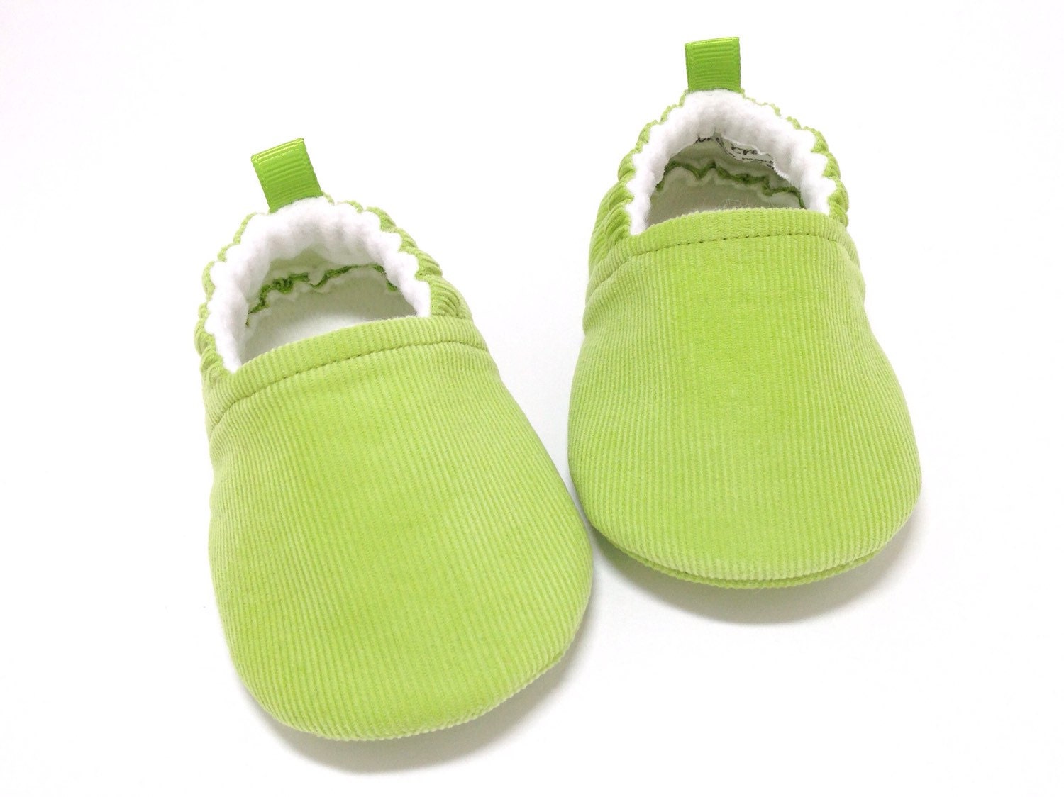 green infant shoes