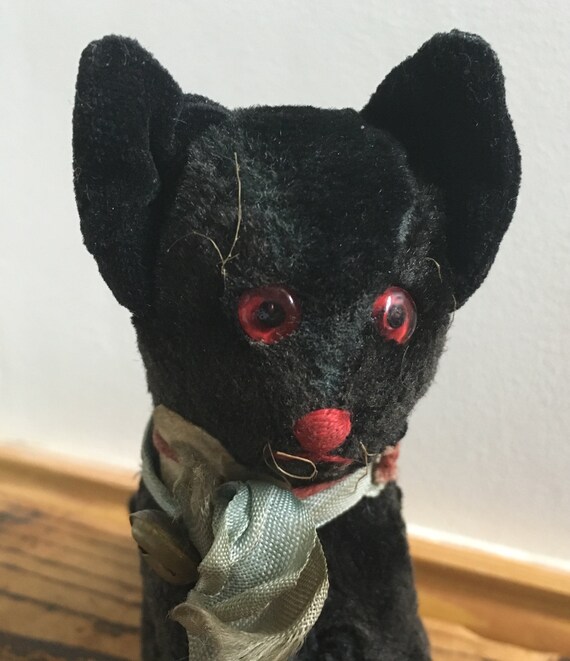 black stuffed cat toy