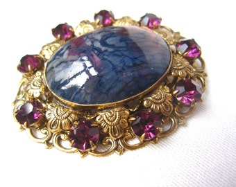 Large 1950s French filigree brass brooch with blue/purple resin stone and purple rhinestones