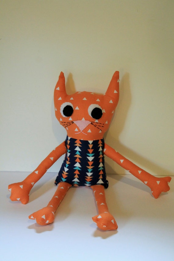 orange stuffed animal cat