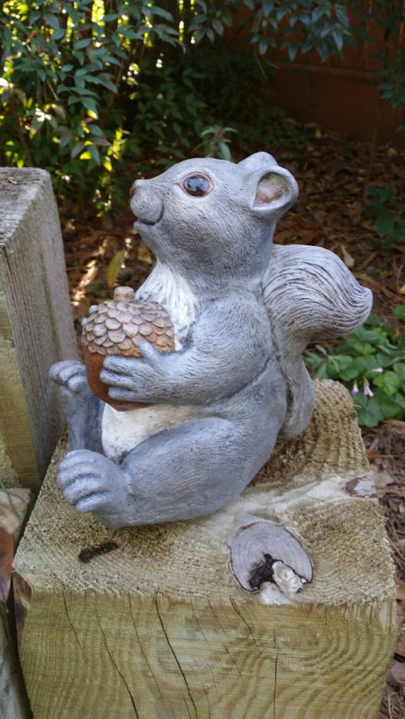 cement squirrel statue